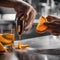 A close-up of a hand expertly zesting an orange peel over a classic cocktail4