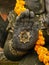 Close up of hand of Ganesh, the elephant-headed Hindu god, with Om Aum symbol, Ubud, Bali