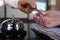 Close up of hand guest takes room key at check-in desk of the hotel.Hotel concept