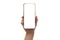 Close up hand hold phone isolated on white, mock-up smartphone white color blank screen, vertical position