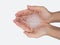 Close up of hand holding silica gel on white background, Desiccant attract moisture for chemical