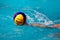 Close-up on a hand holding the water polo ball during the Greek