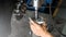 Close up hand of mechanic man seting shock up absorber for car suspension service in auto garage and copy space