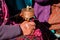 close-up hand of old bhutanese woman praying in Bhutan. Hand holding tibetan prayer wheel