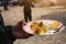 Close-up, hand, person holding a dish, food, food, select focus, blurry background