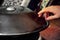 Close up of a hand playing a handpan perkusstion instrument