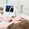 Close-up hand veterinarian performs an ultrasound examination