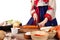 Close up hand woman wearing hanbok cutting vegetable with knife on table preparing cook kimchi traditional food in kitchen copy