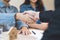 Close up hand of young couple new landlord, tenant or rental handshake with home, apartment agent or realtor woman after bank