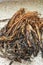 Close-up of a handful of dried vegetables on the table, Guangdong specialty dried cabbage