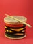Close-up of a handmade Brazilian percussion instrument: a small drum with drumstick.