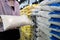 Close up of hands,Asian female consumer holding white rice,shopping dry food,girl buying jasmine rice in transparent plastic bag,