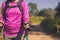 Close up of hands backpacking Asian woman holding trekking pole,Camping hiking concept