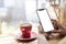 Close up hands of beautiful young woman holding mobile, smart phone sitting in cafe. Soft focus hands of women holding and use