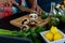 Close up of hands of biracial man preparing dinner, chopping mushrooms in kitchen