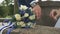 Close-up of hands of bride and groom outdoors