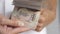 Close up hands counting of thousansds Thai baht money.Close up Human counting Thai banknote, richman count and holding