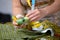 Close up of the hands of a dressmaker