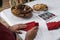 Close up of hands folding Christmas napkins