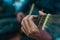 Close-up of the hands of a guitarist pressing the strings