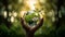 Close-up of hands holding a globe with a tree growing from it