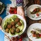 close up hands holding plate with jewish food. High quality photo