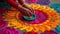 Close-up of the Hands of an Indian Woman Creating a Beautiful Colorful Rangoli Work of Art - Generative AI