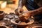 Close-up of hands making clay pots