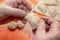 Close-up of hands making dumplings