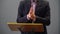 Close up hands of a male public speaker while giving a speech and explaining something. Shallow depth of field