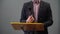 Close up hands of a male public speaker while giving a speech and explaining something. Shallow depth of field