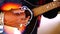 Close up of hands of a man playing a guitar in Ludhiana, Punjab, India