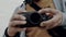 Close-up of the hands of a man who holds the camera and takes a photo by pressing a button. photographer takes a photo. 4k. 4k