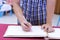 Close up hands of man writing on memory guest book for blessing word to groom and bride in wedding ceremony