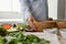 Close-up of hands pregnant woman preparing salad