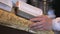 Close-up of hands of priest reading the holy bible