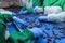 Close up of hands processing olives in a factory