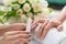 Close-up of the hands of a qualified manicurist filing the nails