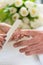 Close-up of the hands of a qualified manicurist filing the nails