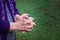 Close-up of hands senior woman joined together for prayer. Concept of aged people and religion