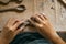 Close up of hands shaping ceramic