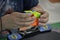 Close-up of hands solving a Rubik`s Cube. Color puzzle.