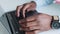 Close up of hands typing on keyboard of laptop, busy replying to contact us messages on a website. Online planning