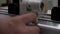 Close up for hands using measuring machine in carpentry. Footage. The process of fixation on the scale mark of the