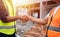 Close up of Handshake, Professional male civil engineer or Architect with contractor, foreman worker.