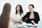 Close up.handshake of two business women after discussing the terms of the contract