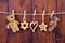 Close up of hanging gingerbread and teddy bear - rustic country