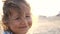 Close-up happy child face. Children in summer nature view at the beach, 4k
