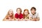 Close-up of happy children lying on floor in studio and looking up, isolated on white background