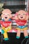 close up,Happy dolls for garden decoration havegreeting in Thai.